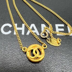 Chanel 1983 CC medallion-pendant necklace.  Gold Plated.
